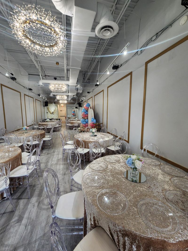 Champagne linens with charger plates and small bouquet centerpieces